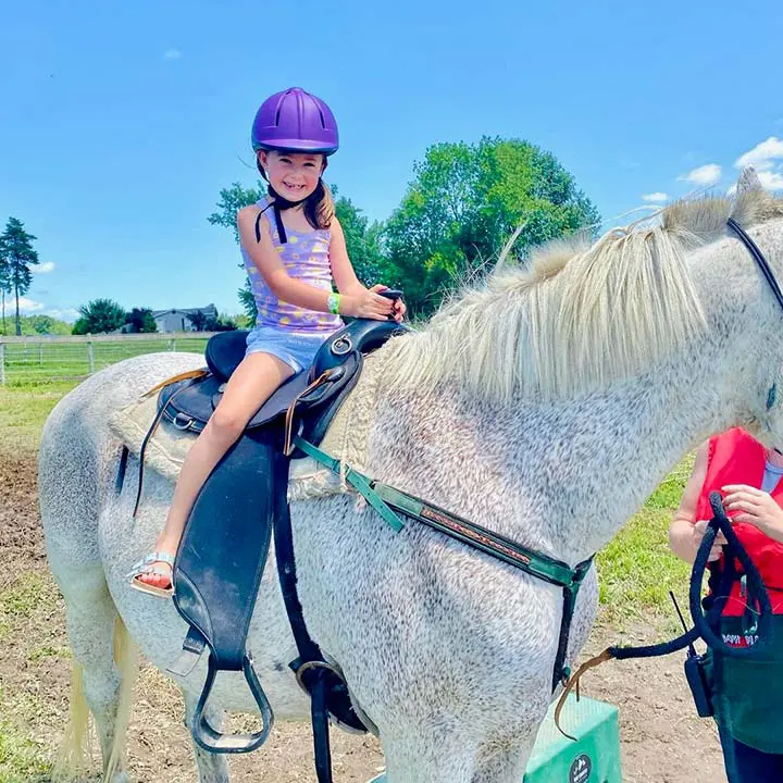 Girl Riding Horse
